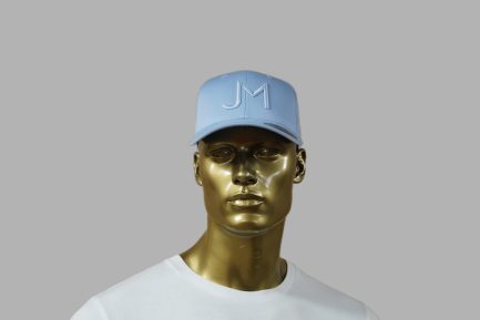 New Edition blauw JM trucker cap